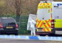 A forensic officer at the scene in Shetland Close, Bradford, on Tuesday