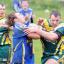 Queensbury try-scorer Joe Swain puts a Hunslet Old Boys opponent under pressure