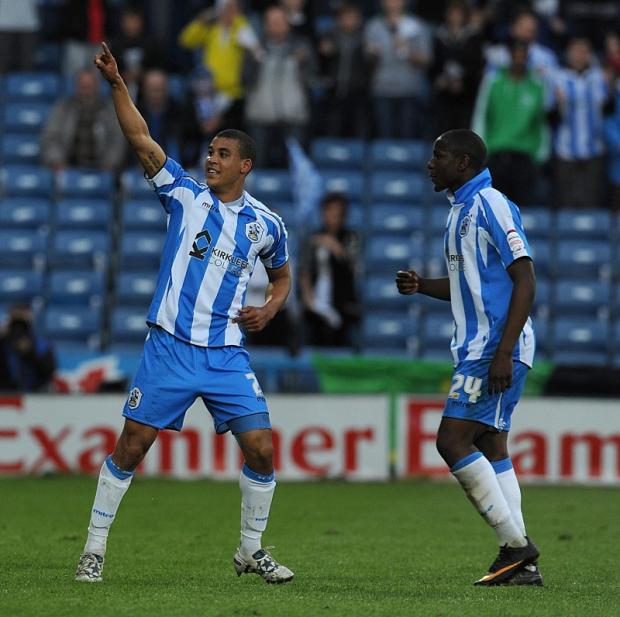 Lee Peltier, left, has joined Leeds on a three-year deal